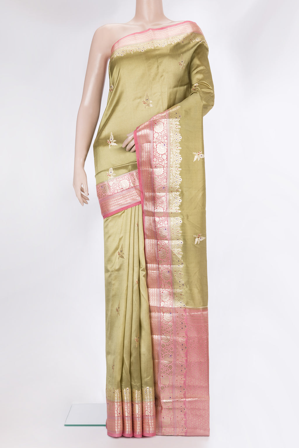 Pure Silk Green Dual Tone Tussar Saree with Zari Butta on the body and Fancy Border.  displayed on a mannequin
