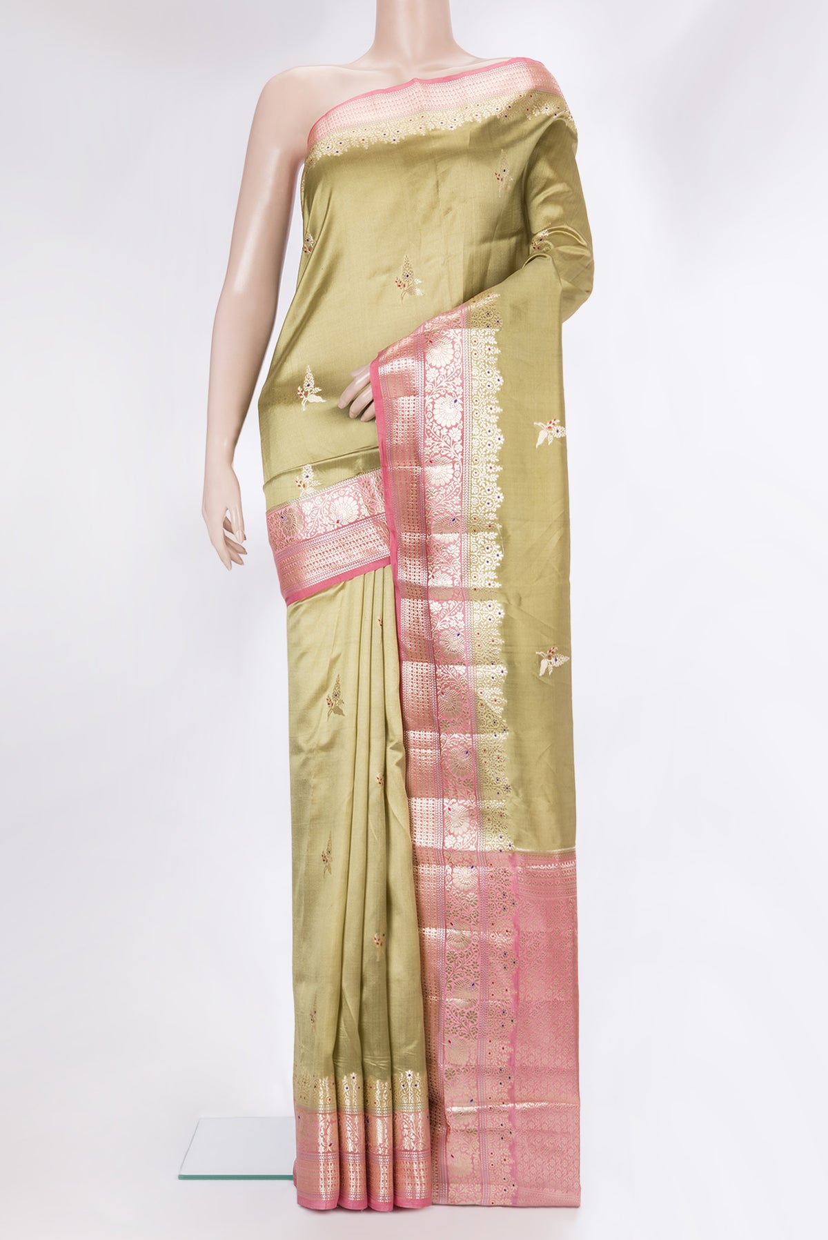 Pure Silk Green Dual Tone Tussar Saree with Zari Butta on the body and Fancy Border.  displayed on a mannequin