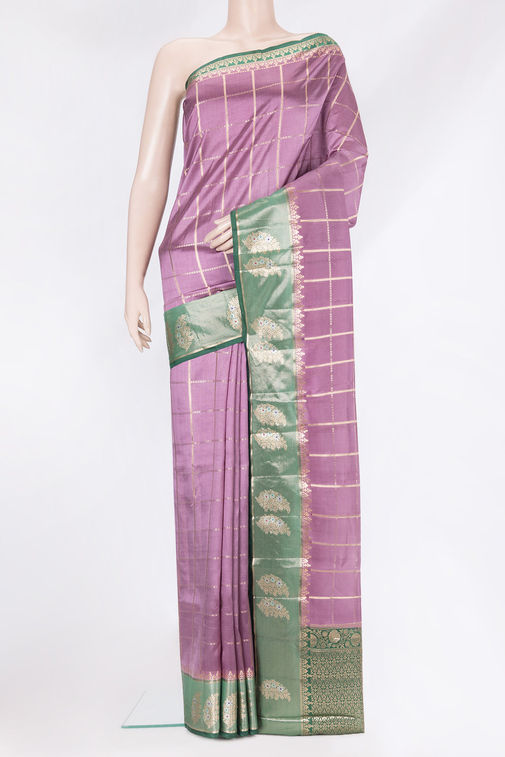 Purple Tussar Silk Saree with Checked design on the body and Fancy Border.  displayed on a mannequin