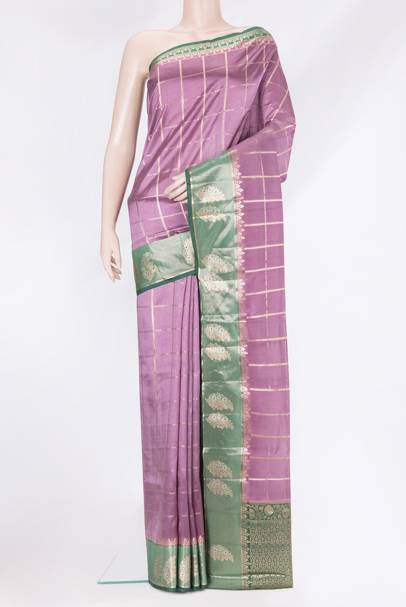 Purple Tussar Silk Saree with Checked design on the body and Fancy Border.  displayed on a mannequin