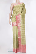 Pure Silk Pista Green Dual Tone Tussar Saree with Checked design on the body and Fancy Border.  displayed on a mannequin