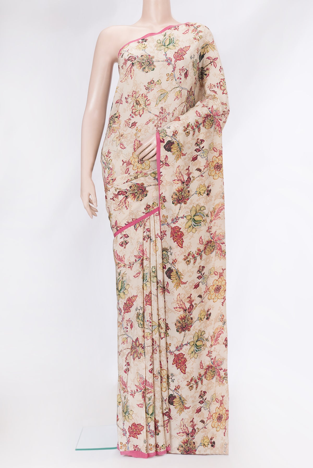Beige Mysore Crepe Saree with Printed design on the body and Plain Border.  displayed on a mannequin