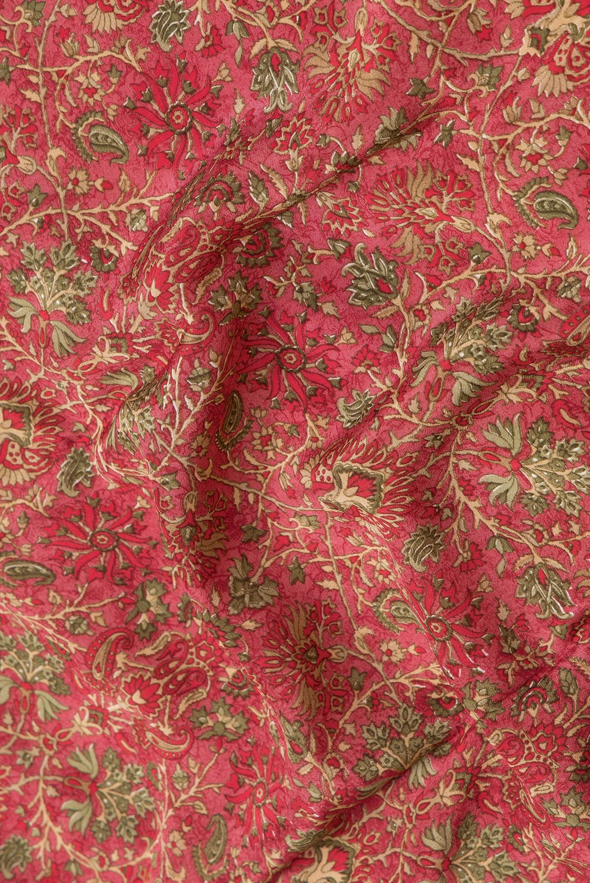 Close up of Pink Dual Tone Mysore Crepe Saree with Printed design on the body and Printed Border.  displaying folds