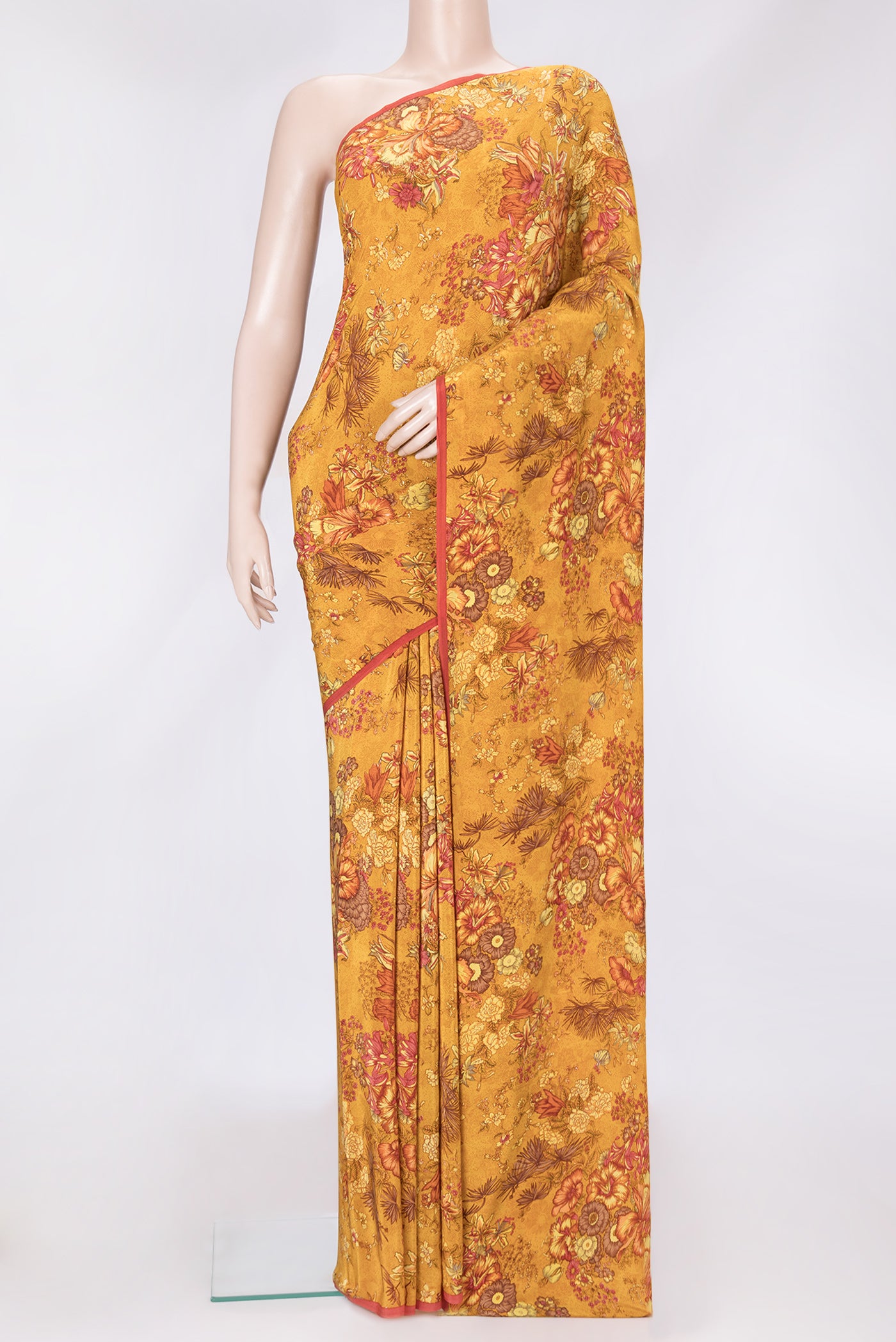 Mustard Dual Tone Mysore Crepe Saree with Printed design on the body and Plain Border.  displayed on a mannequin
