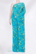 Sky Blue Crepe Saree with Printed design on the body and Plain Border.  displayed on a mannequin