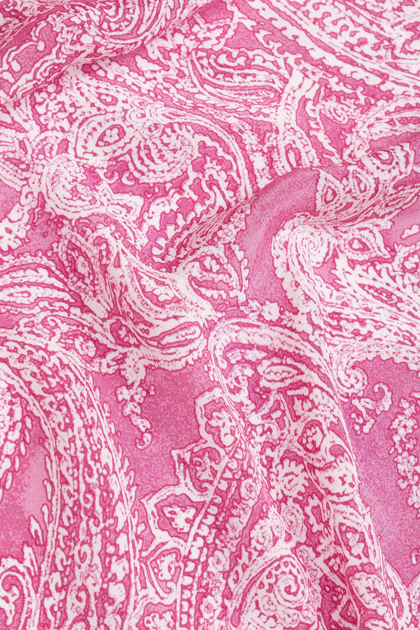 Close up of Pink Dual Tone Mysore Crepe Saree with Printed design on the body and Without Border.  displaying folds