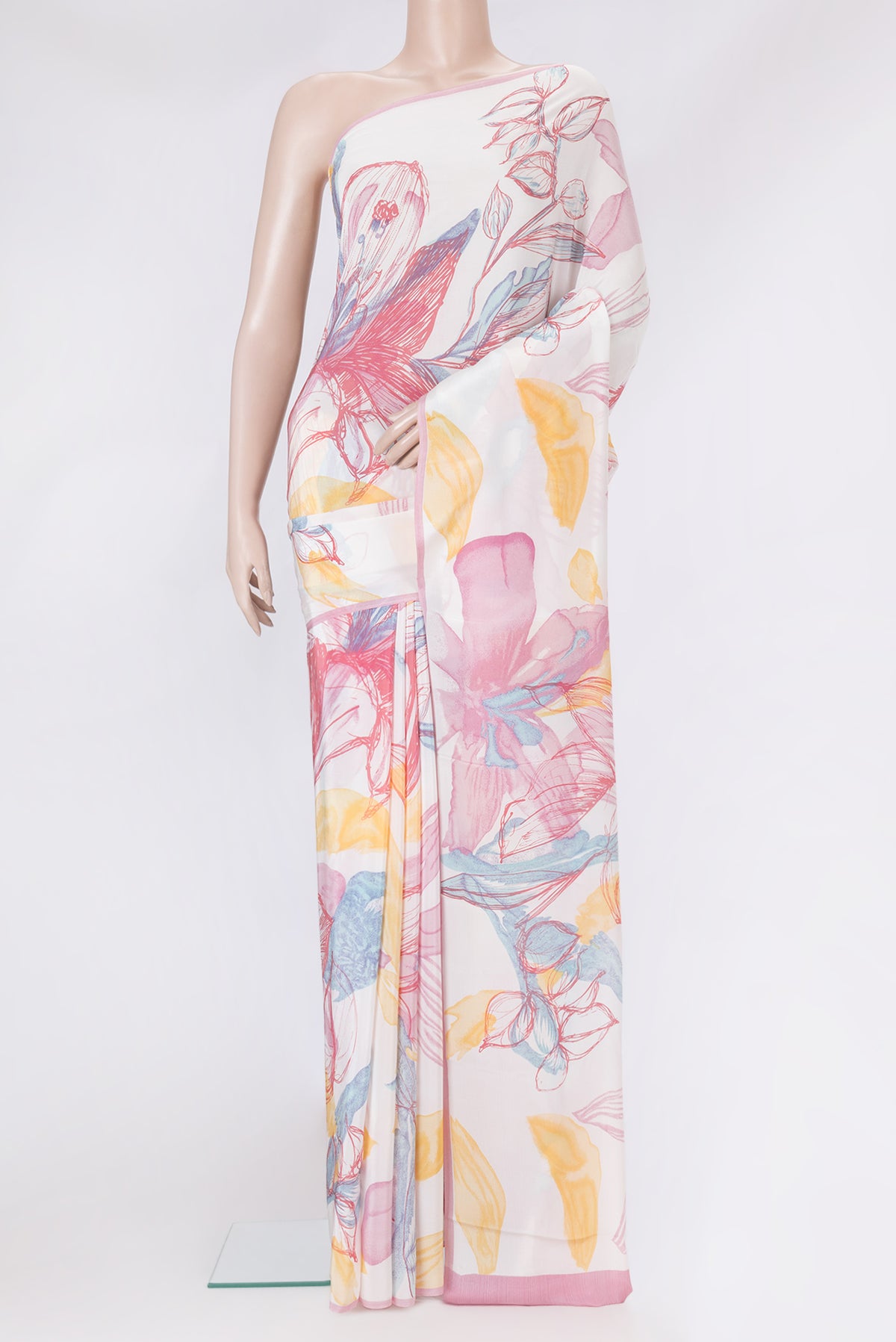 Off White Dual Tone Crepe Saree with Printed design on the body and Without Border.  displayed on a mannequin