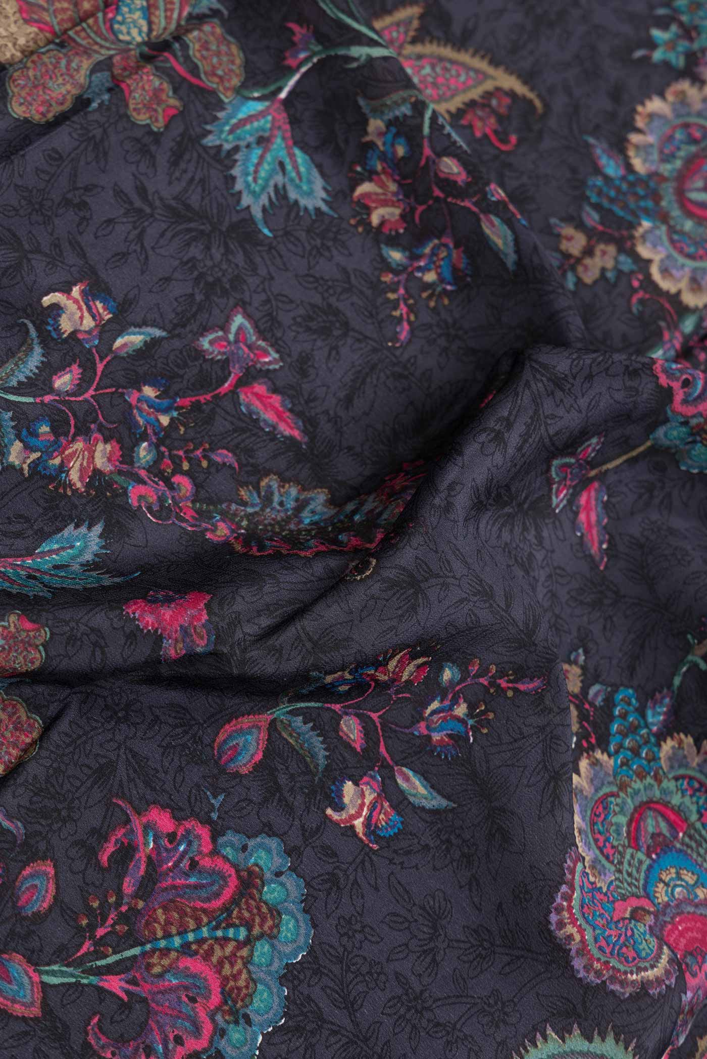 Close up of Grey Dual Tone Mysore Crepe Saree with Printed design on the body and Printed Border.  displaying folds