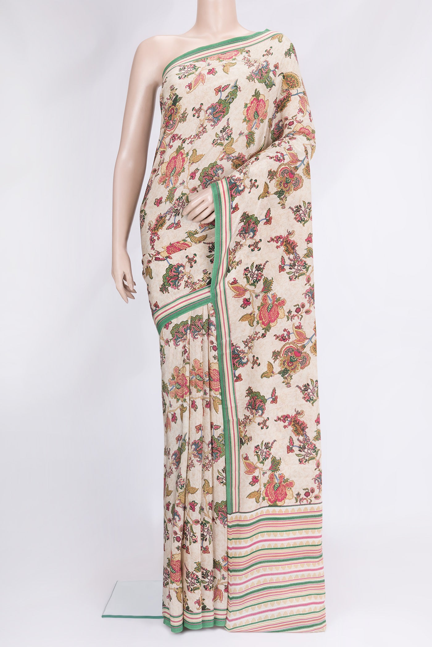 Beige Dual Tone Mysore Crepe Saree with Printed design on the body and Printed Border.  displayed on a mannequin