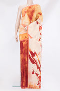 Rust Crepe Saree with Printed design on the body and Plain Border.  displayed on a mannequin
