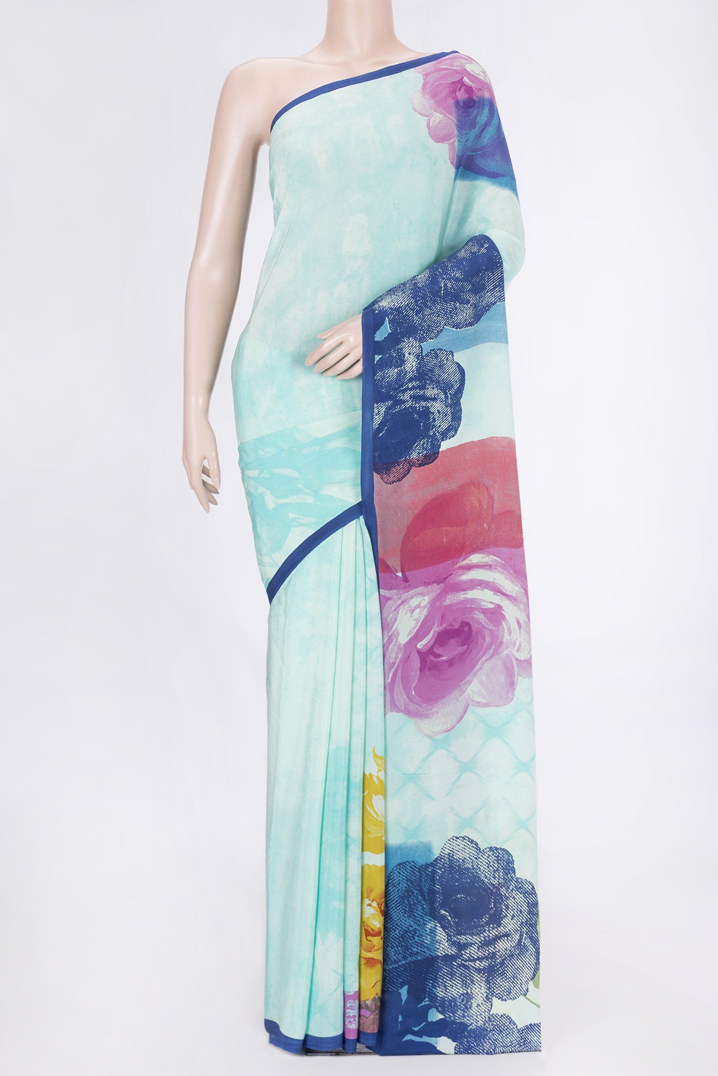 Sky Blue Dual Tone Mysore Crepe Saree with Printed design on the body and Plain Border.  displayed on a mannequin