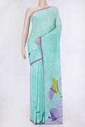 Sky Blue Dual Tone Mysore Crepe Saree with Printed design on the body and Plain Border.  displayed on a mannequin