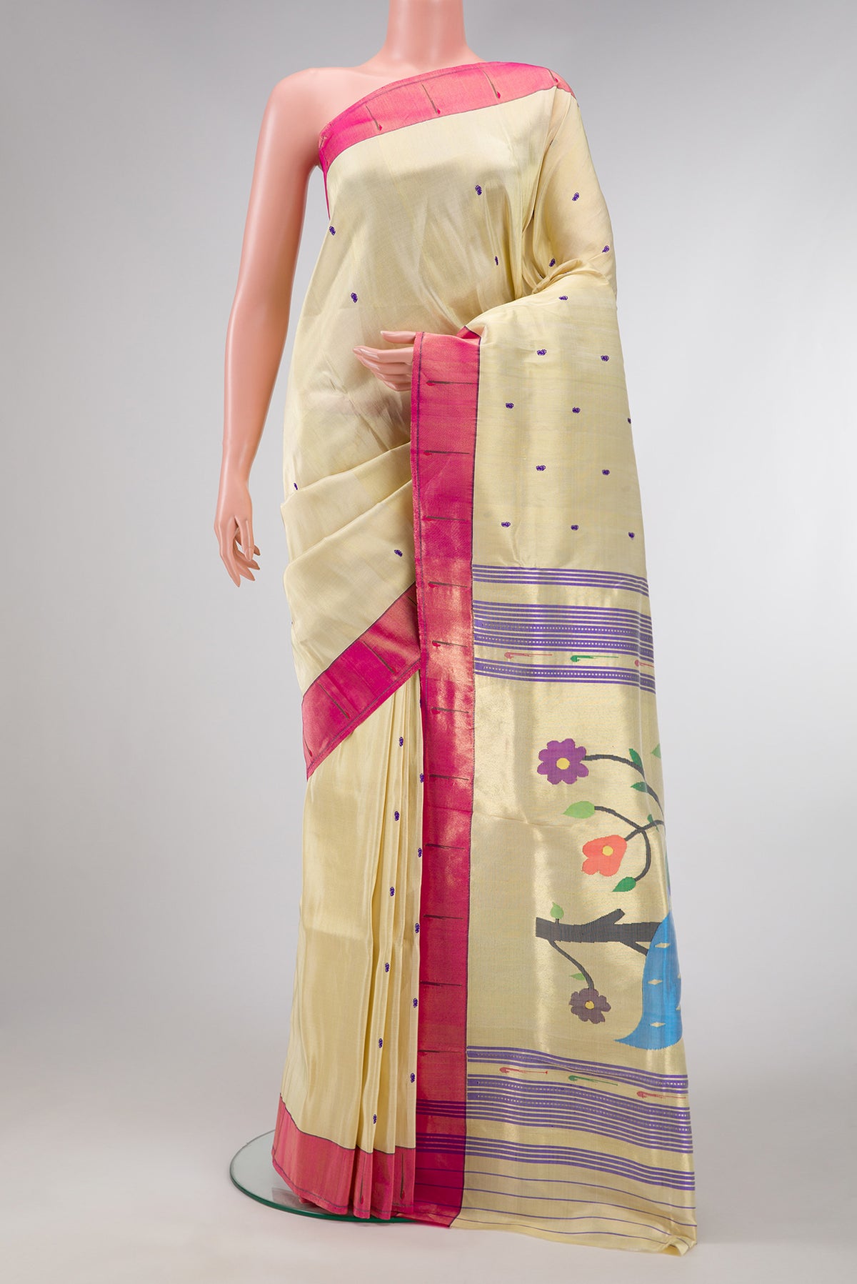 Gold Dual Tone Paithani Silk Saree with Thread Butta on the body and Paithani Border.  displayed on a mannequin