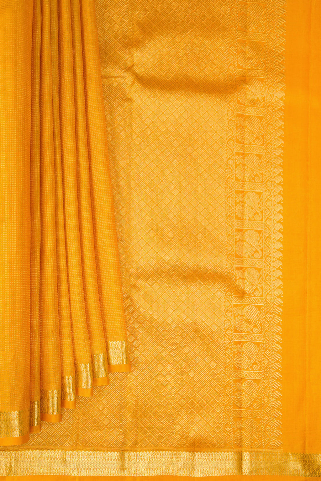 Pleats and pallu of Pure Silk Mustard Kanchipuram Saree with Stripes on the body and Zari Border. 