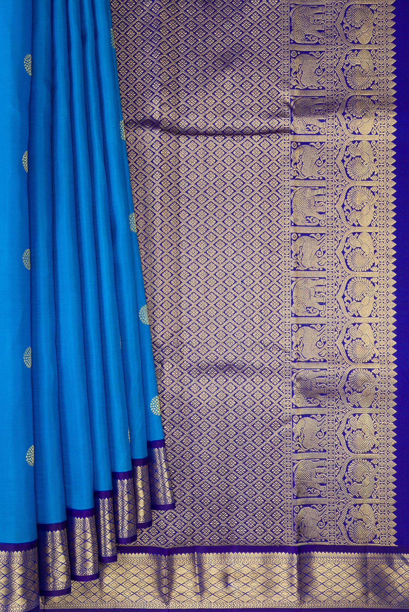 Pleats and pallu of Pure Silk Sky Blue Kanjivaram Saree with Zari Butta on the body and Zari Border. 