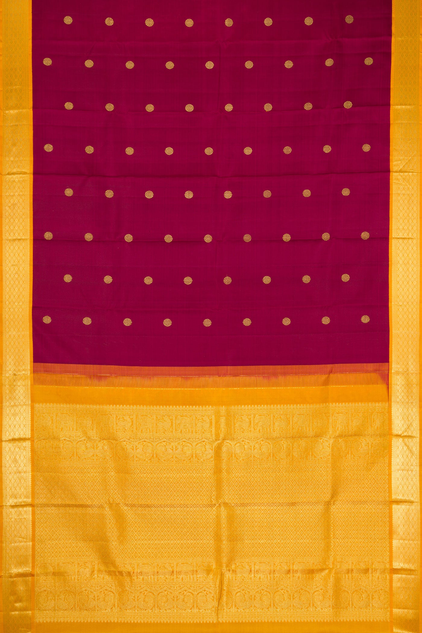 Flat view of Maroon Kanjivaram Silk Saree with Zari Butta on the body and Zari Border. 