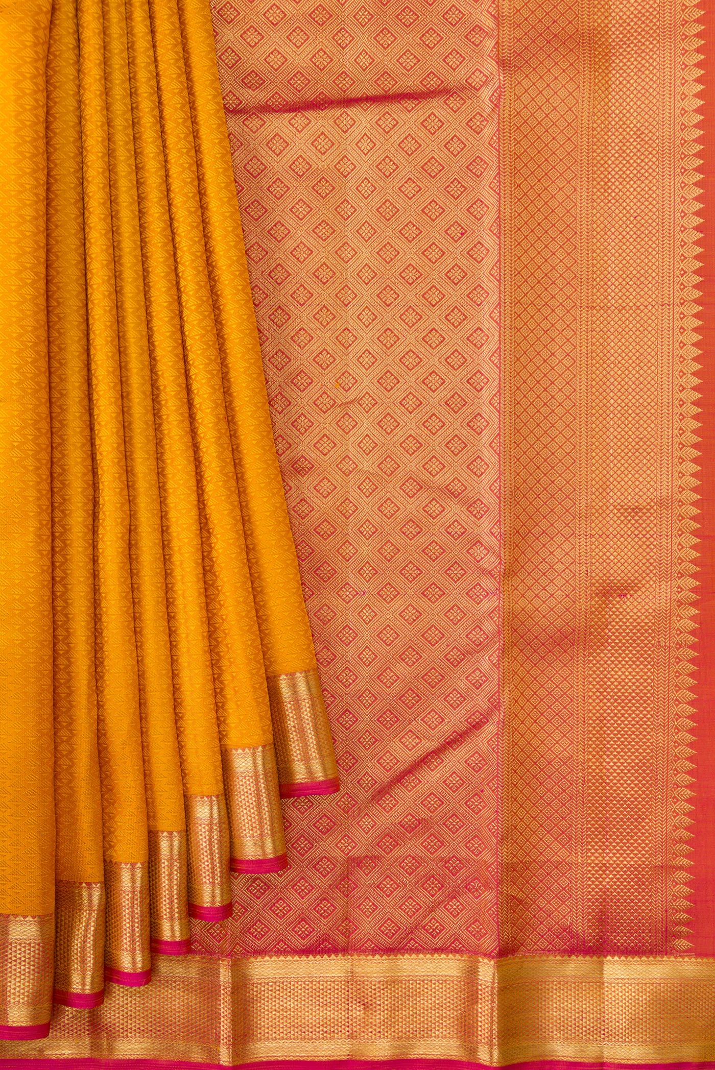 Pleats and pallu of Mustard Dual Tone Kanjivaram Silk Saree with Jacquard design on the body and Zari Border. 