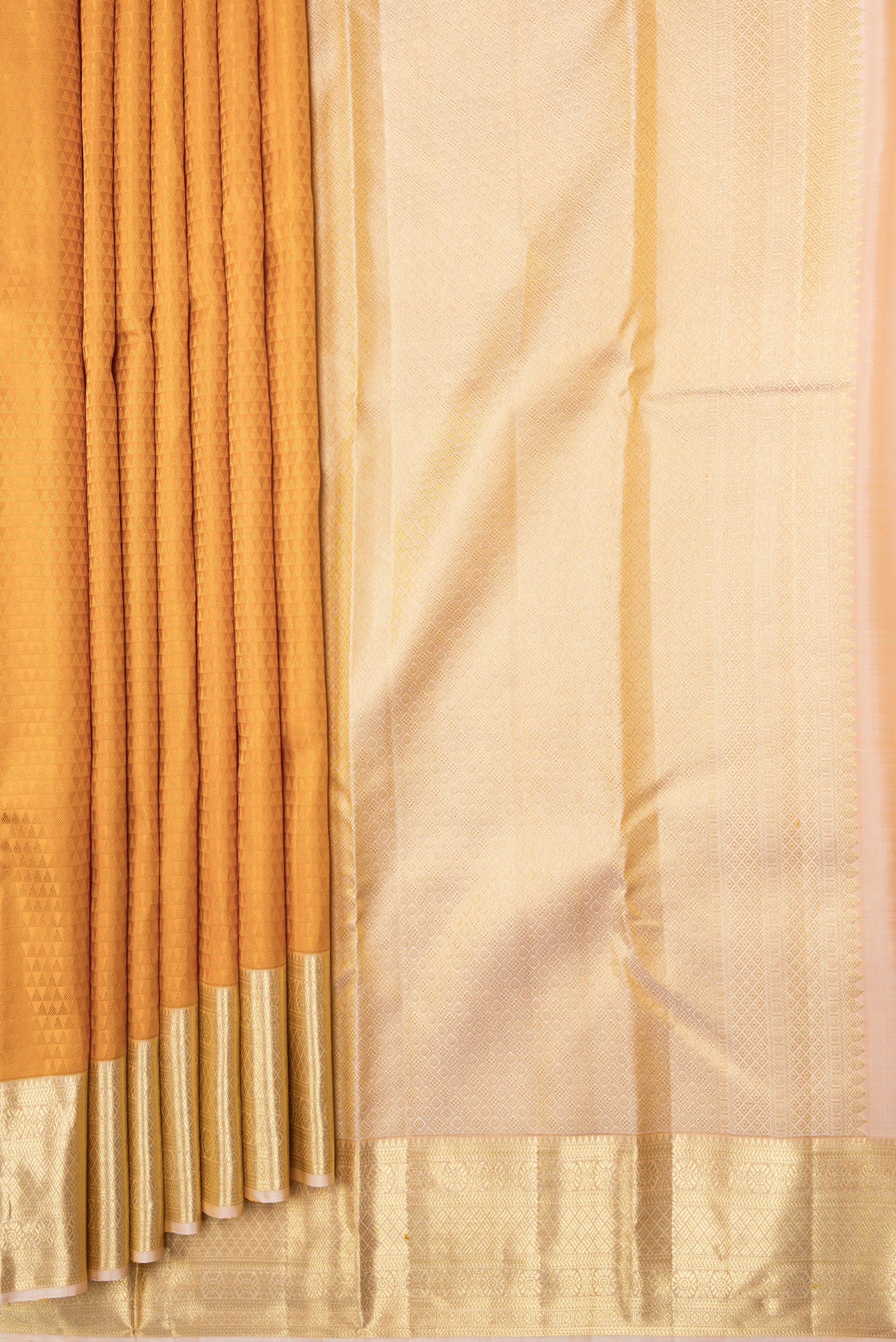 Pleats and pallu of Mustard Dual Tone Kanjivaram Silk Saree with Jacquard design on the body and Zari Border. 