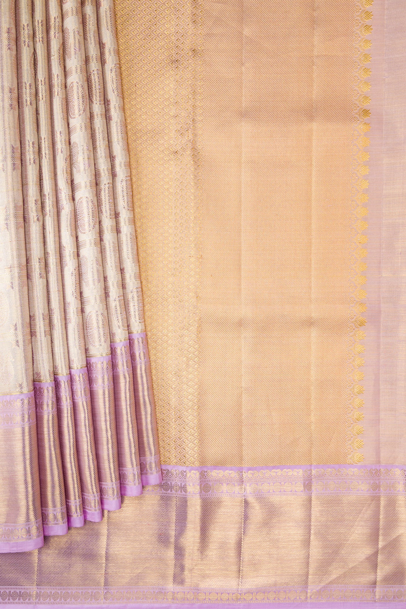 Pleats and pallu of Gold Dual Tone Kanjivaram Tissue Silk Saree with Zari Brocade on the body and Zari Border. 