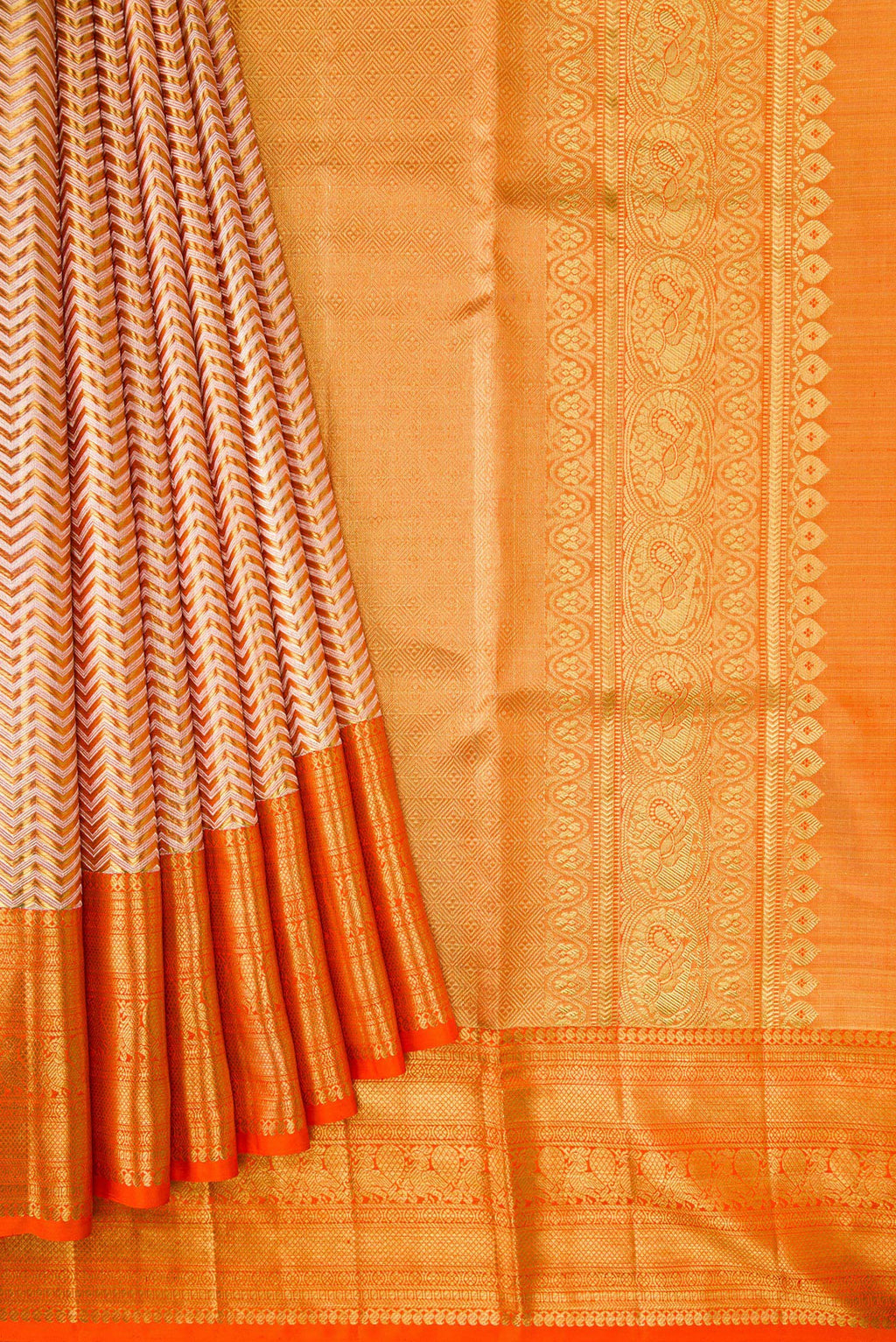 Pleats and pallu of Gold Dual Tone Kanjivaram Tissue Silk Saree with Zari Brocade on the body and Zari Border. 