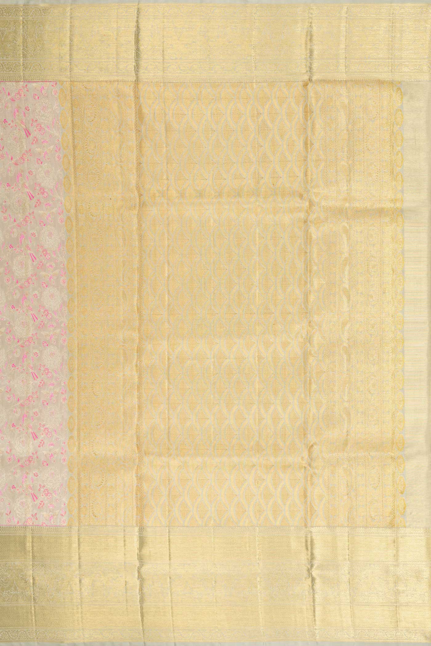 Close up image of the pallu of Grey Dual Tone Kanjivaram Tissue Silk Saree with Zari Brocade on the body and Zari Border. 