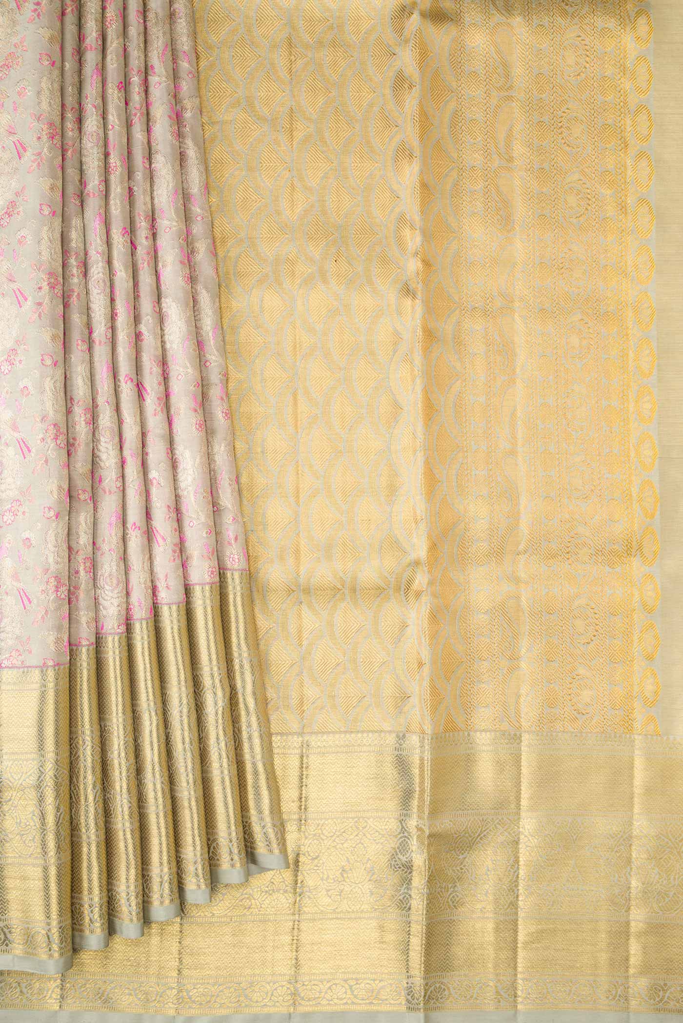 Pleats and pallu of Grey Dual Tone Kanjivaram Tissue Silk Saree with Zari Brocade on the body and Zari Border. 