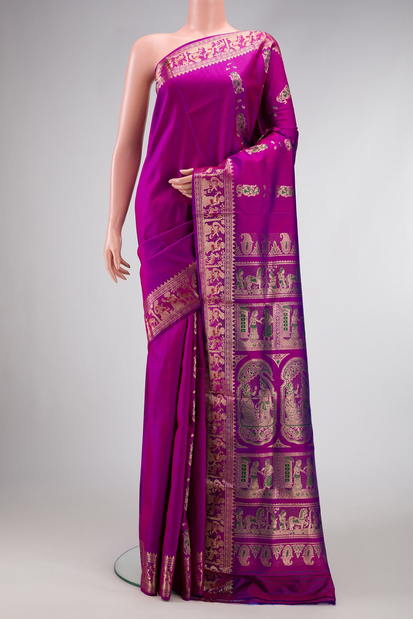 Purple Dual Tone Baluchari Silk Saree with Zari And Thread Butta on the body and Zari Border.  displayed on a mannequin