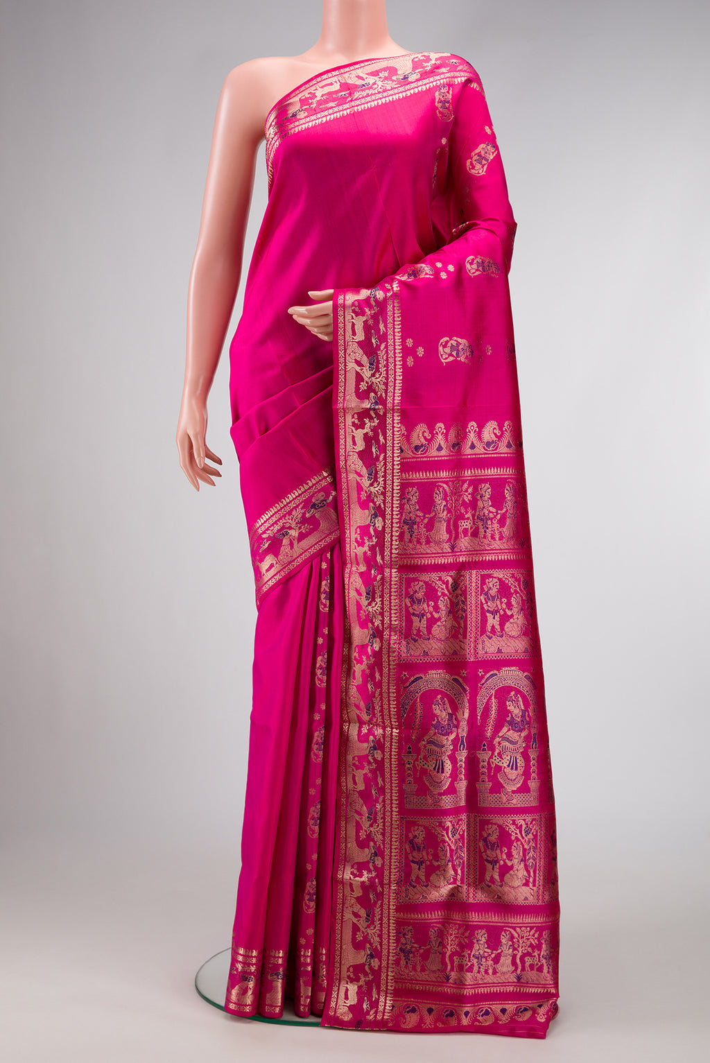 Pink Dual Tone Baluchari Silk Saree with Zari And Thread Butta on the body and Zari Border.  displayed on a mannequin