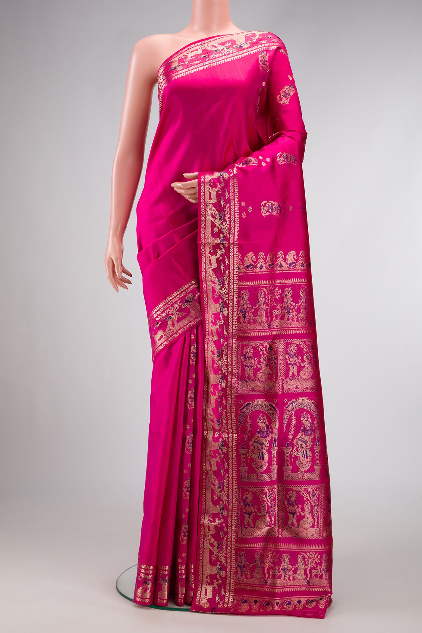 Pink Dual Tone Baluchari Silk Saree with Zari And Thread Butta on the body and Zari Border.  displayed on a mannequin