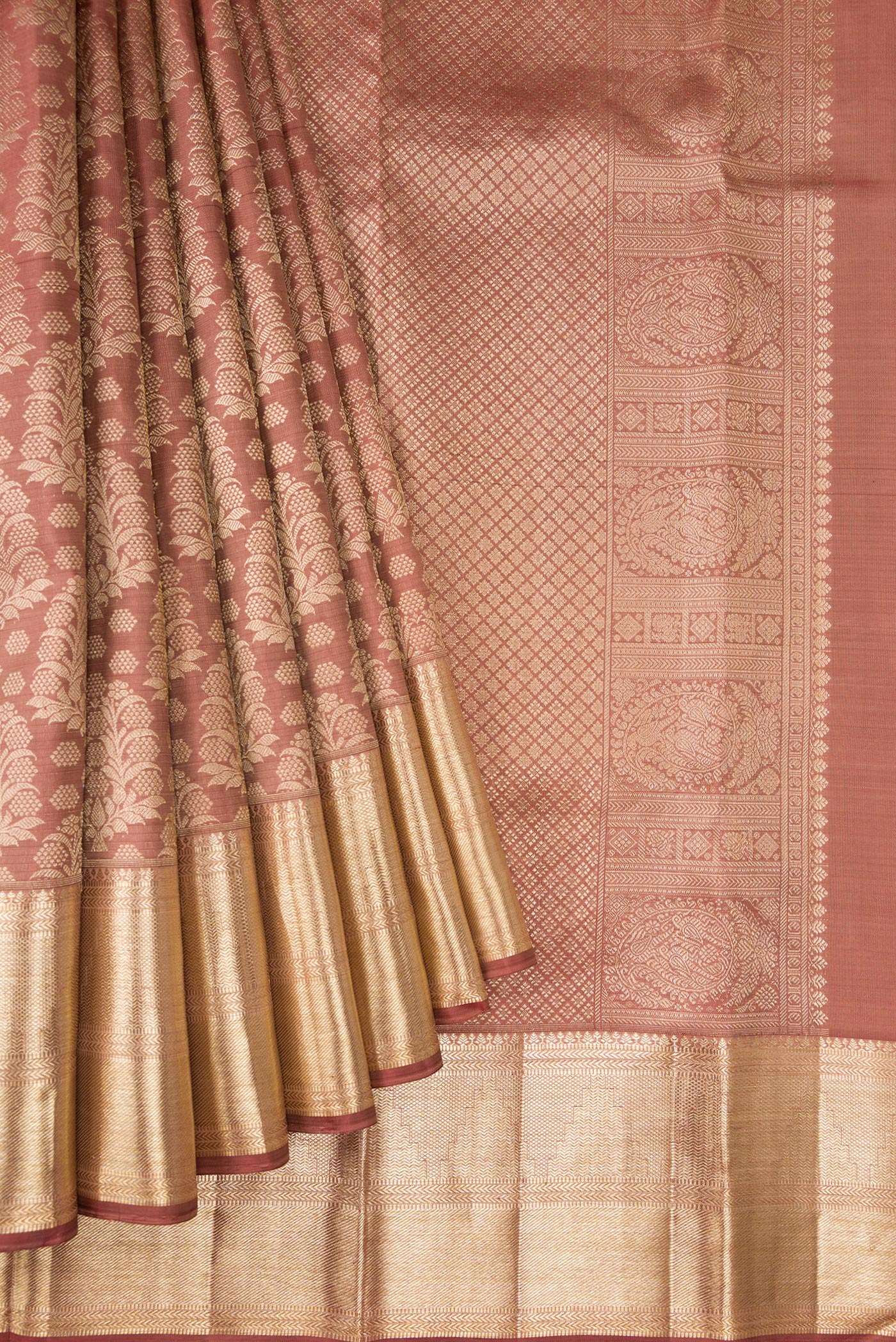 Pleats and pallu of Rose Gold Dual Tone Kanchipuram Silk Saree with Zari Brocade on the body and Zari Border. 