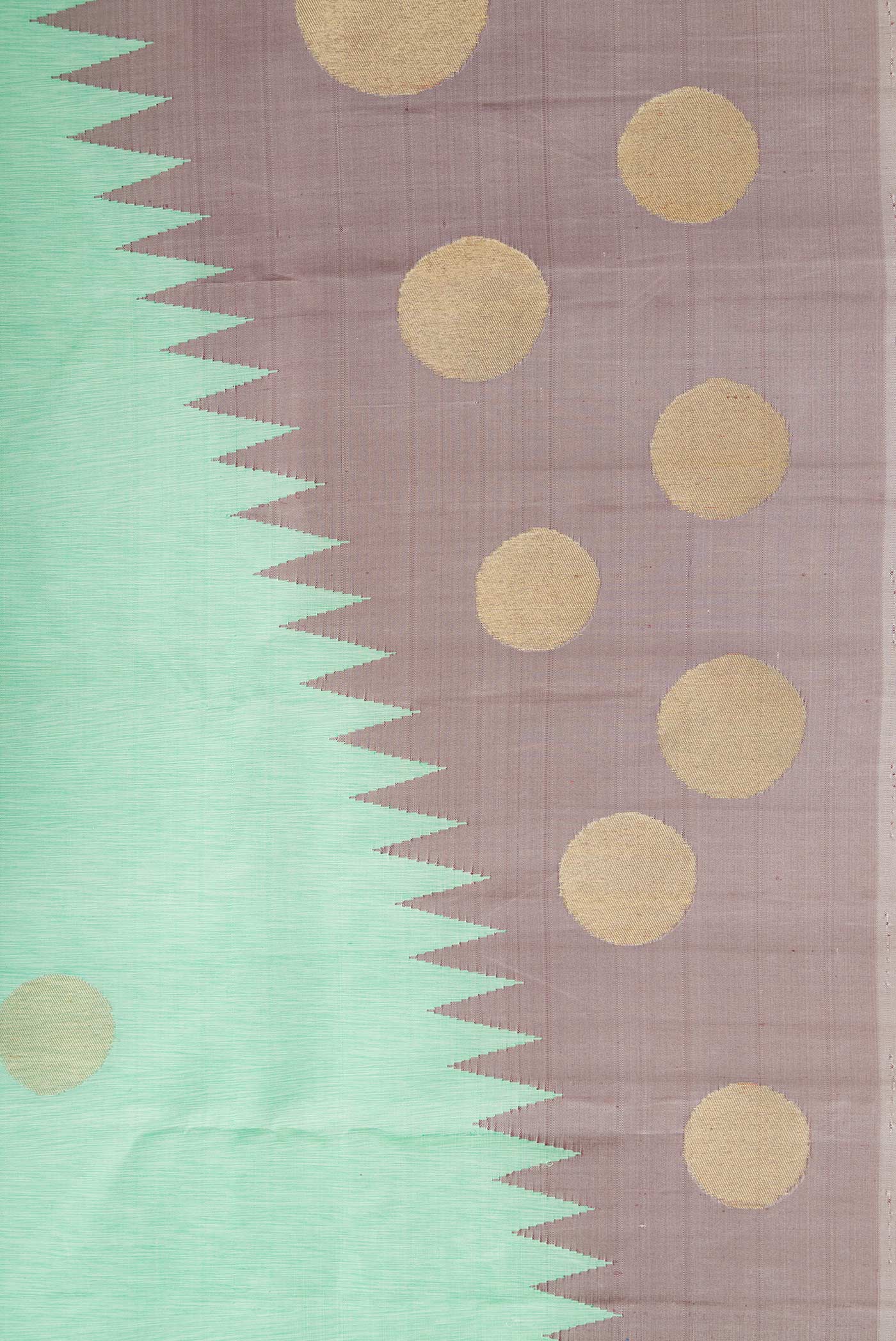 Border image of Pure Silk Pure Zari Sea Green Kanchipuram Saree with Zari Butta on the body and Rising Temple Border