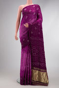 Purple Dual Tone Bandhani Silk Saree with Printed design on the body and Printed Border.  displayed on a mannequin