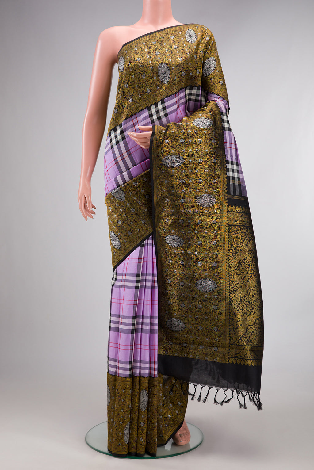 Pure Silk Pure Zari Lavender Kanjivaram Saree with Checked design on the body and Fancy Border.  displayed on a mannequin