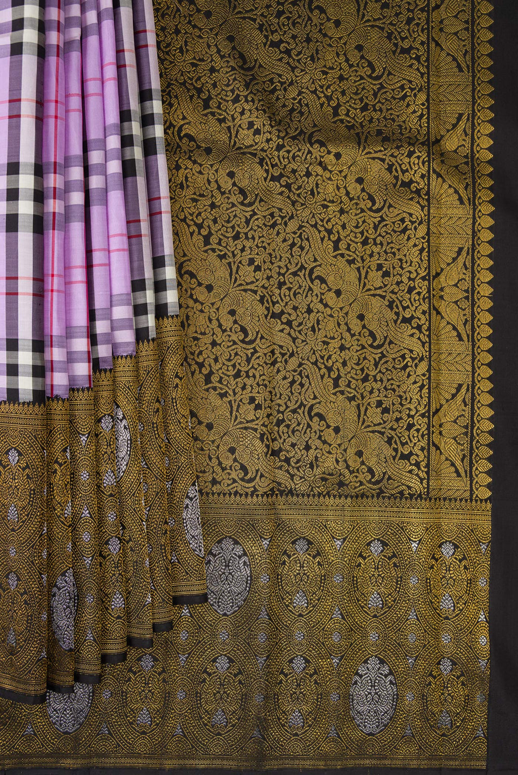 Pleats and pallu of Pure Silk Pure Zari Lavender Kanjivaram Saree with Checked design on the body and Fancy Border. 