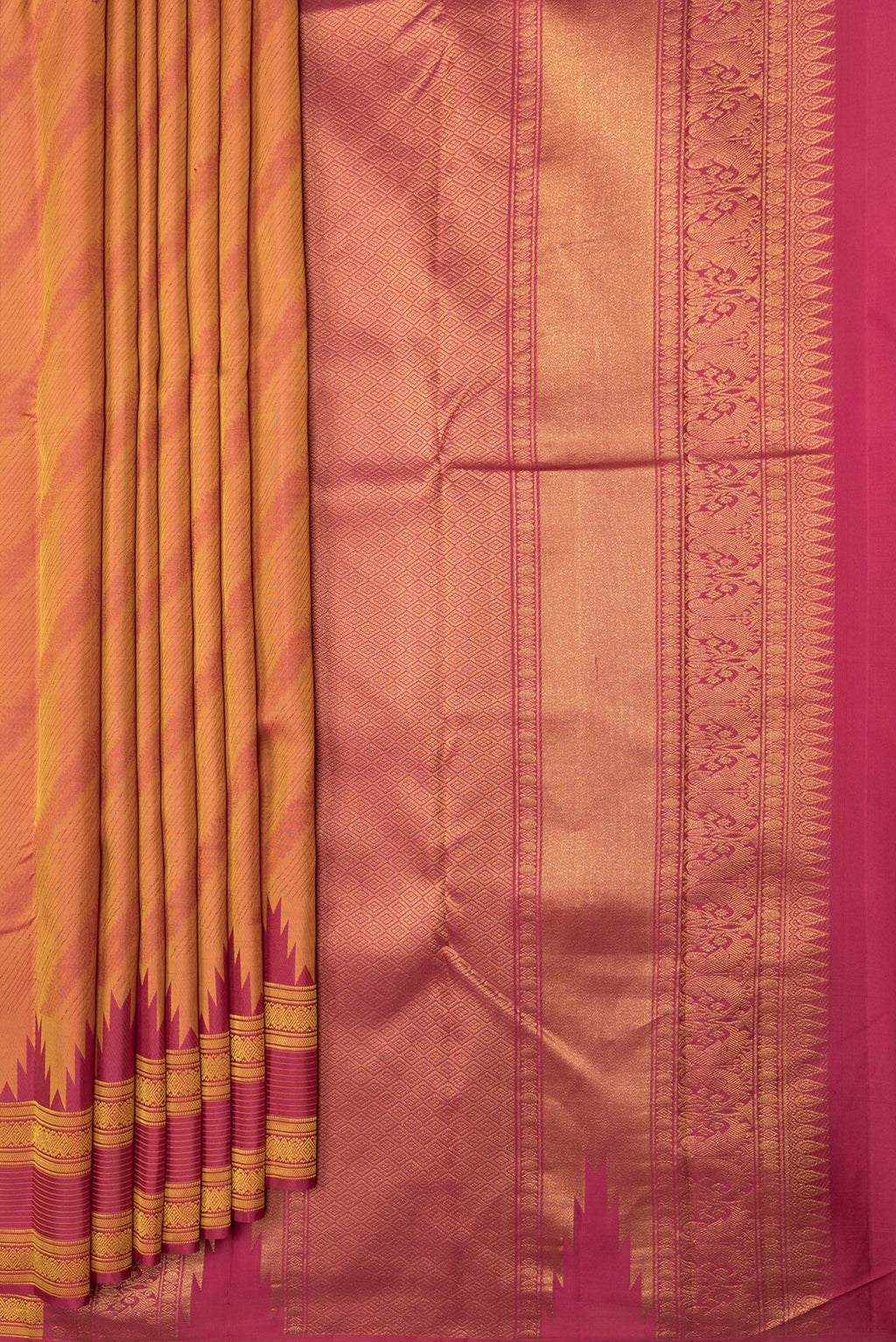 Pleats and pallu of Mustard Dual Tone Kanchipuram Silk Saree with Jacquard design on the body and Thread Border. 