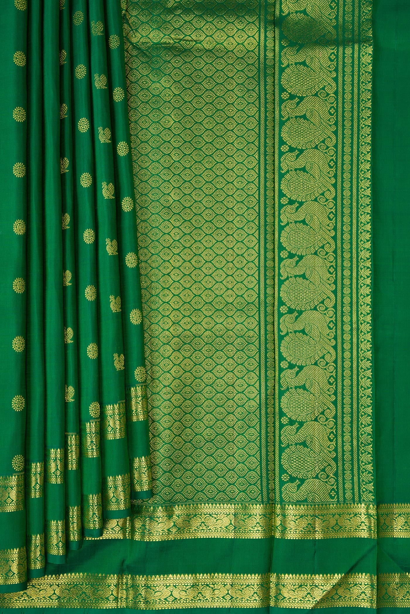 Pleats and pallu of Green Kanjivaram Silk Saree with Zari Butta on the body and Zari Border. 