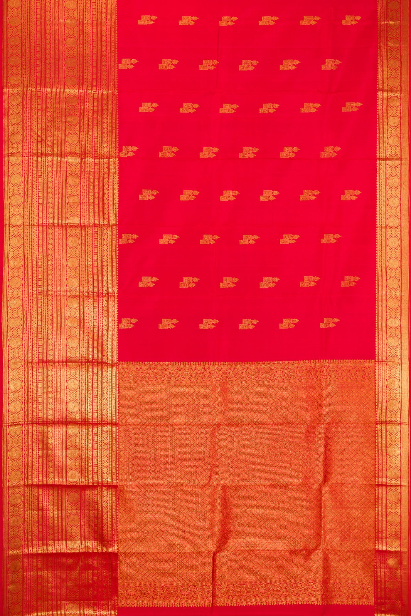 Flat view of Red Kanchipuram Silk Saree with Zari Butta on the body and Zari Border. 