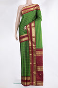 Pure Silk Green Kanjivaram Saree with Stripes on the body and Zari Border.  displayed on a mannequin