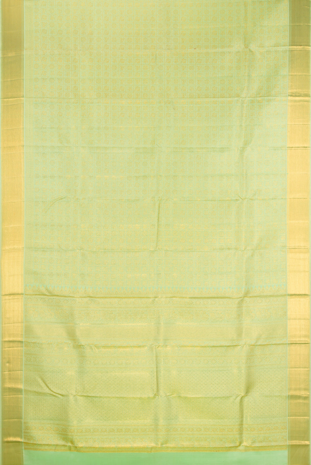 Flat view of Pure Silk Pista Green Kanjivaram Saree with Zari Brocade on the body and Zari Border. 