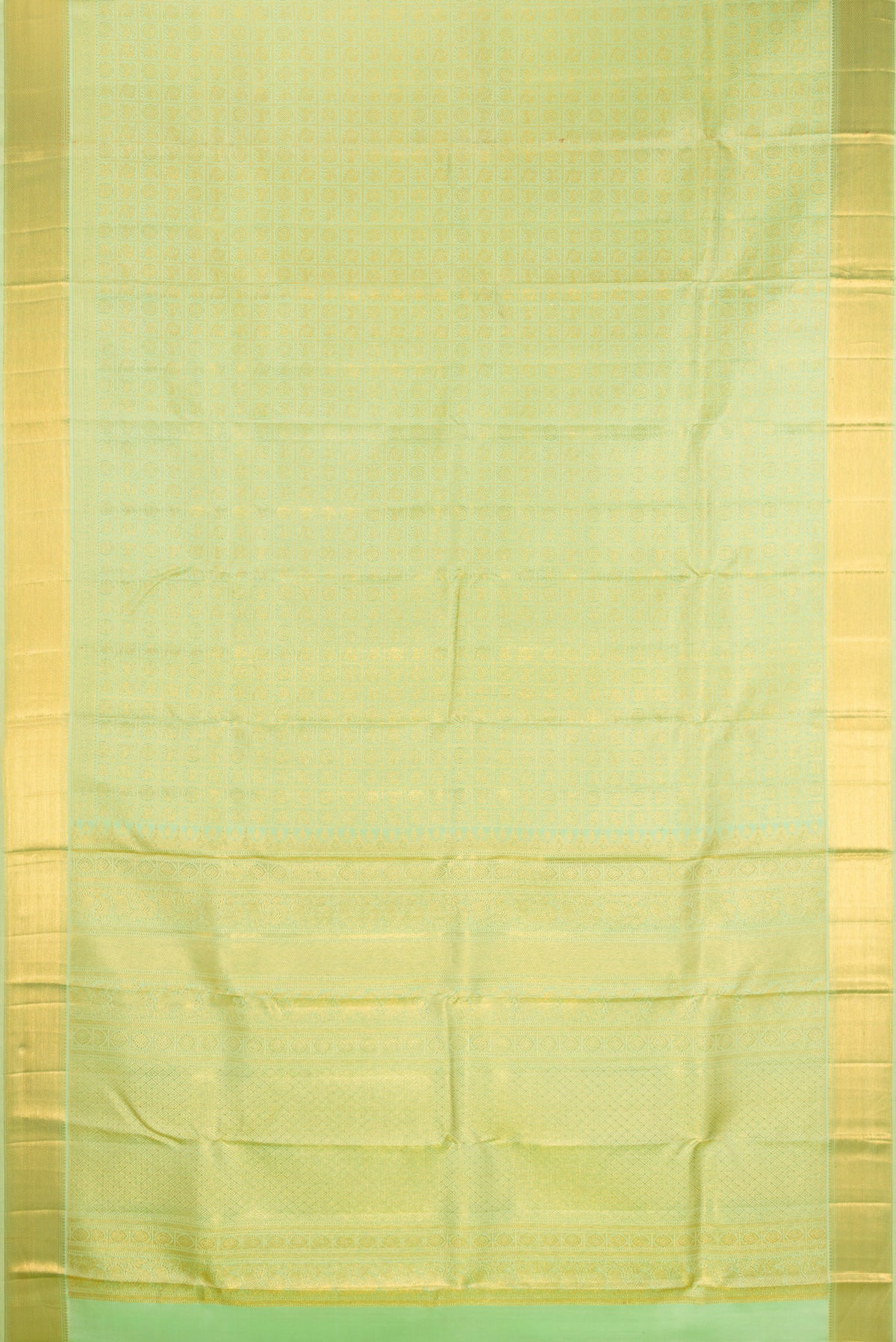 Flat view of Pure Silk Pista Green Kanjivaram Saree with Zari Brocade on the body and Zari Border. 