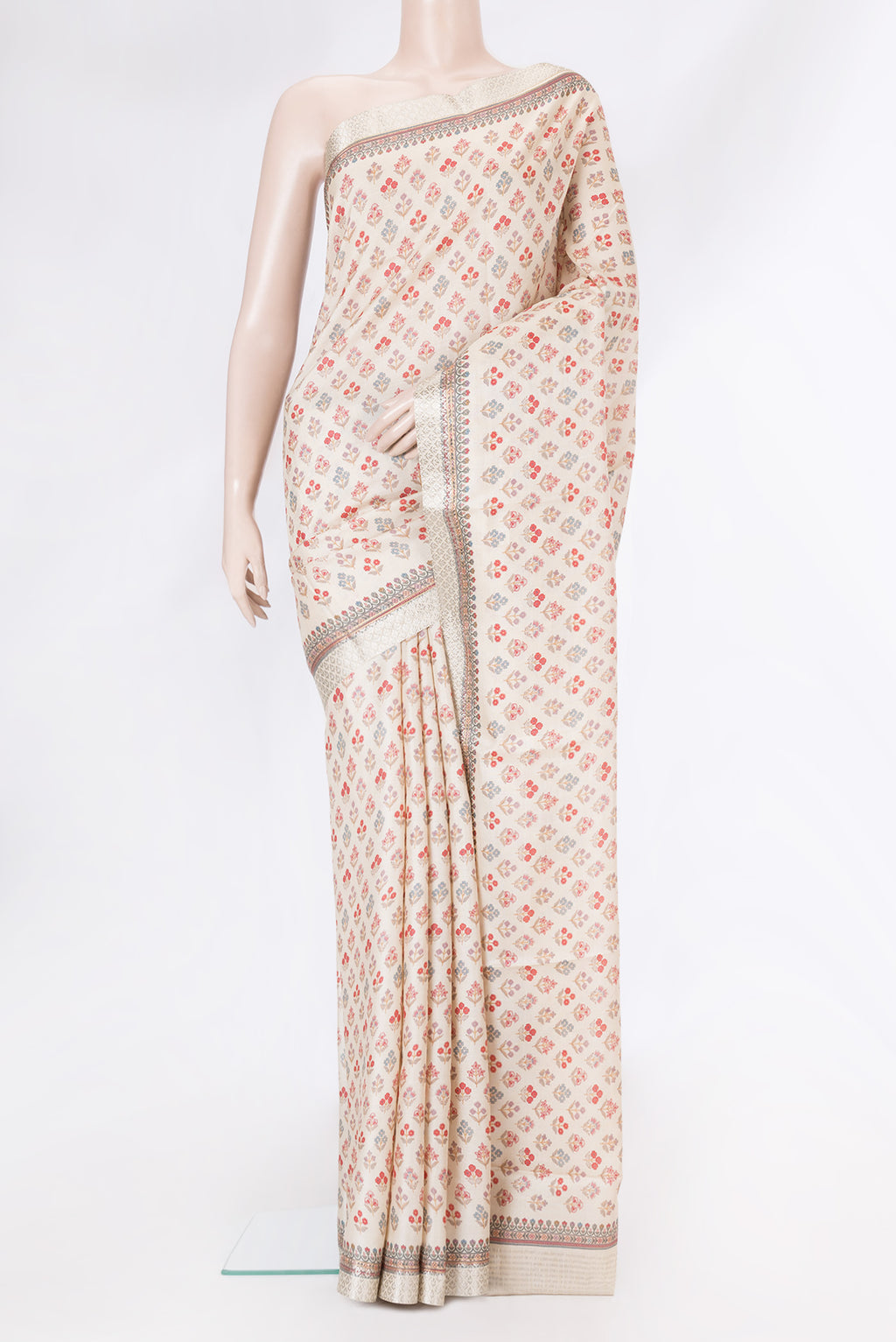 Beige Dual Tone Tussar Silk Saree with Printed design on the body and Fancy Border.  displayed on a mannequin