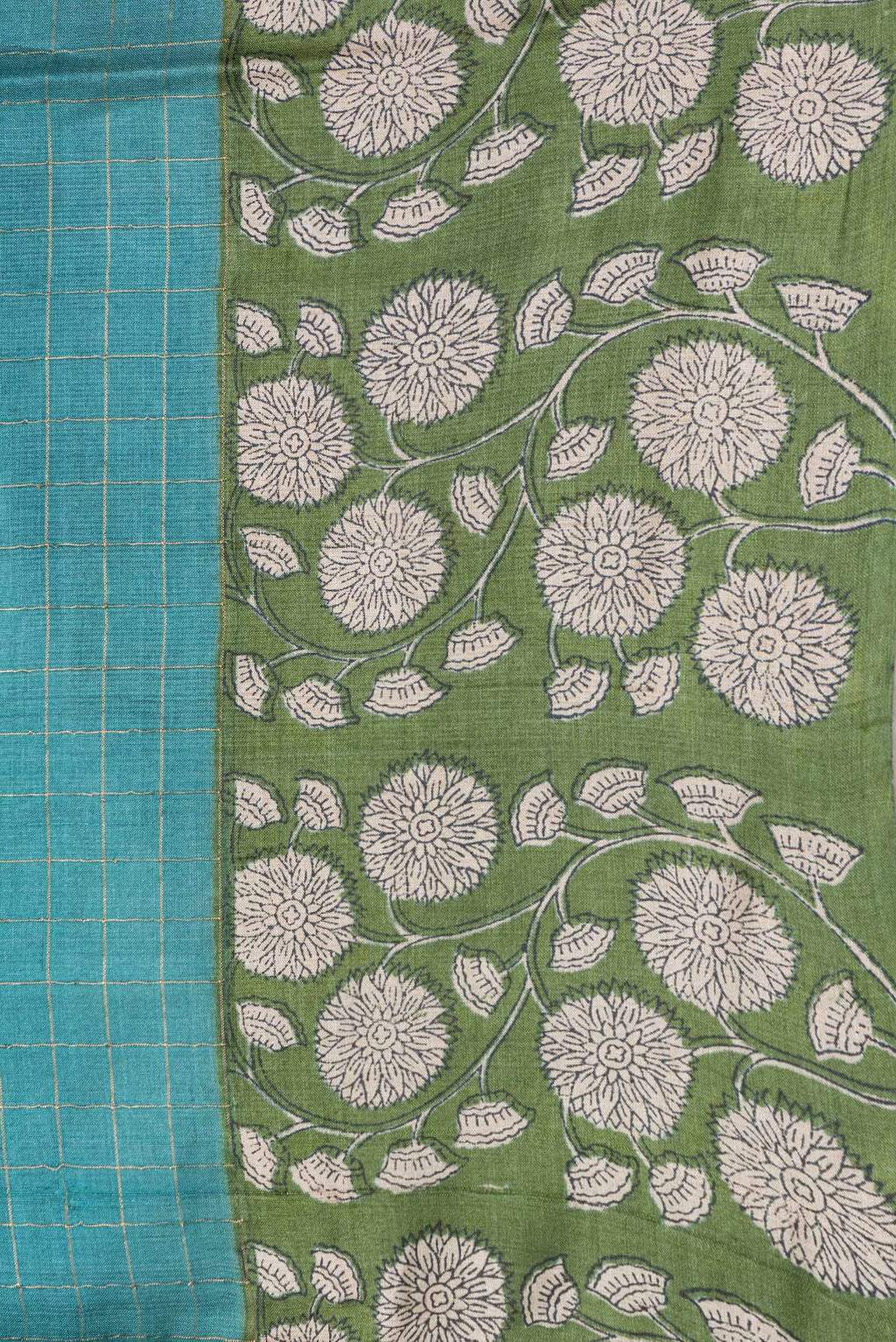 Border image of Peacock Blue Dual Tone Tussar Silk Saree with Printed design on the body and Zari Border. 
