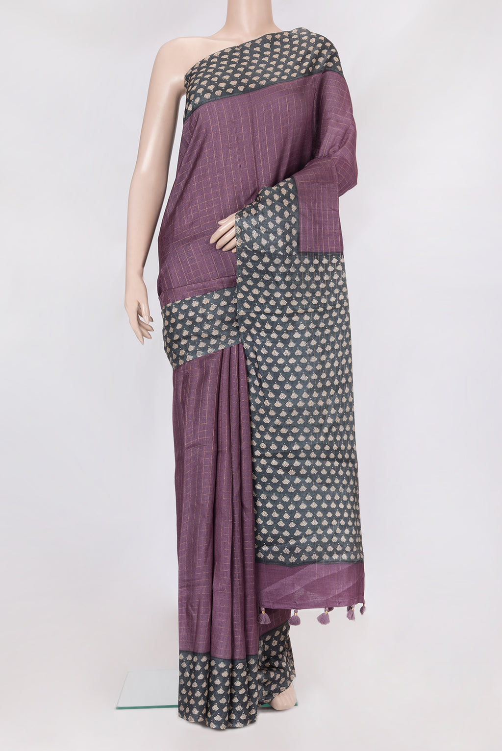 Purple Tussar Silk Saree with Checked design on the body and Printed Border.  displayed on a mannequin