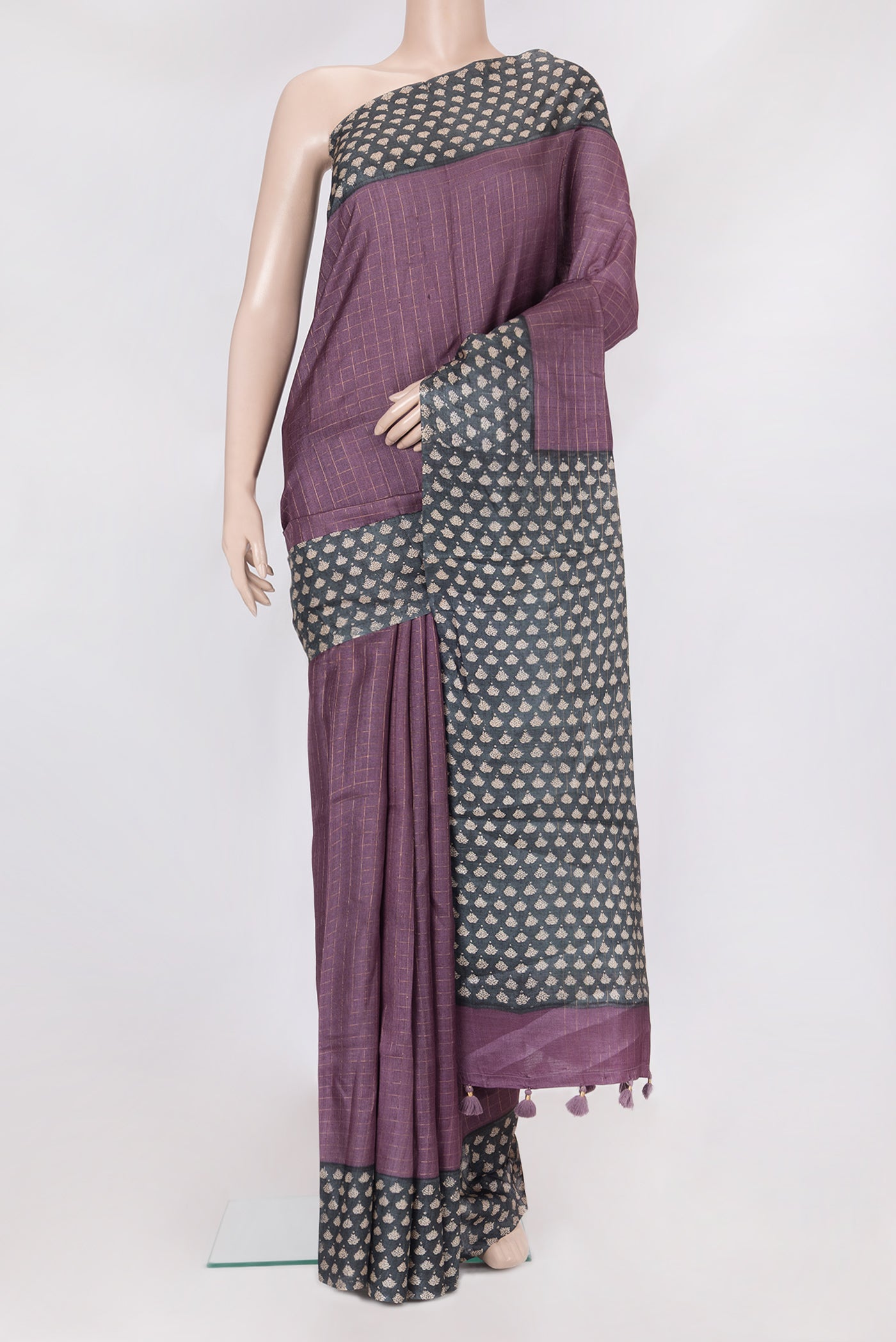 Purple Tussar Silk Saree with Checked design on the body and Printed Border.  displayed on a mannequin