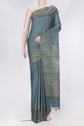 Grey Dual Tone Tussar Silk Saree with Checked design on the body and Printed Border.  displayed on a mannequin