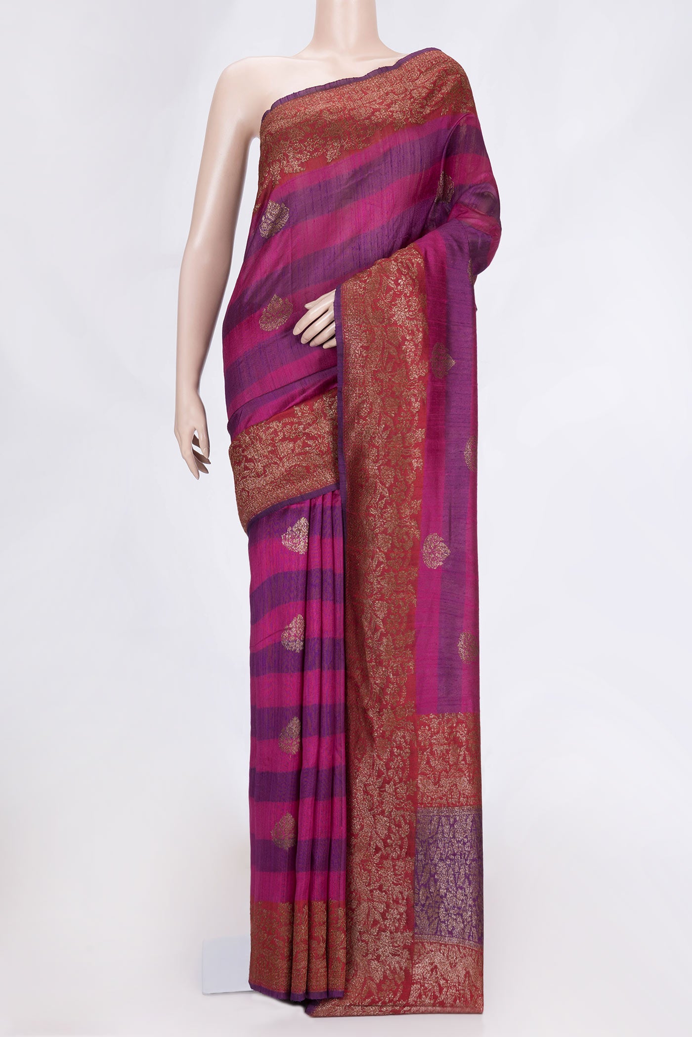 Magenta Dual Tone Tussar Saree with Zari Butta on the body and Zari Border.  displayed on a mannequin