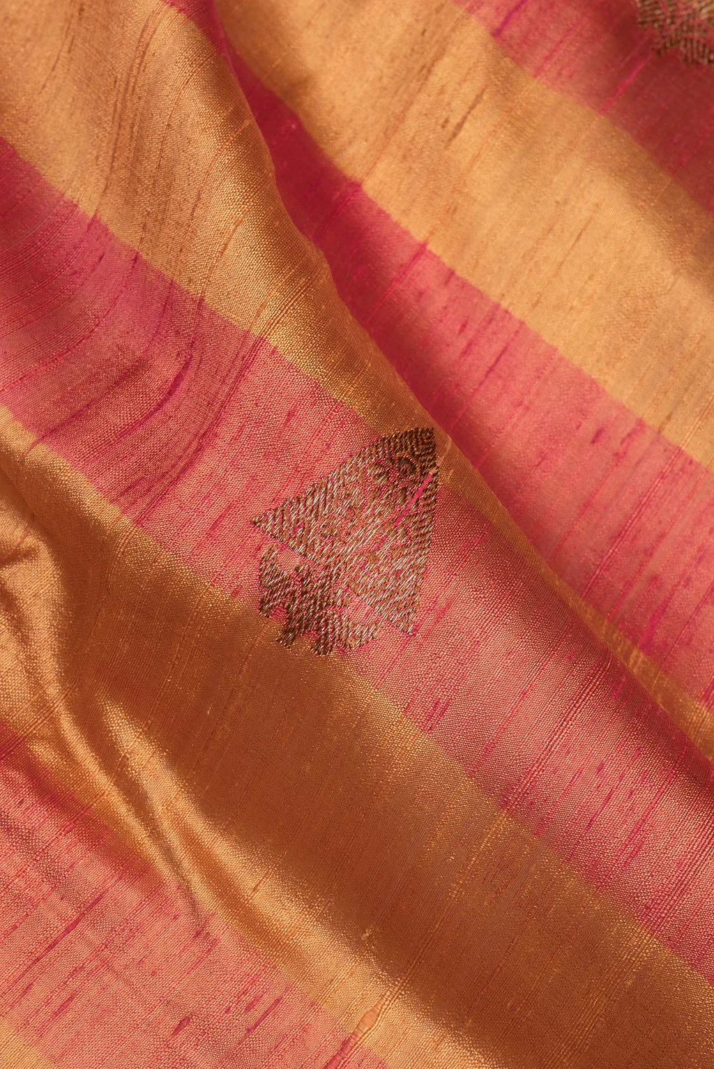 Close up of Multi Color Tussar Saree with Zari Butta on the body and Fancy Border.  displaying folds