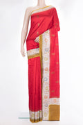 Pure Silk Red Tussar Saree with Zari Butta on the body and Fancy Border.  displayed on a mannequin