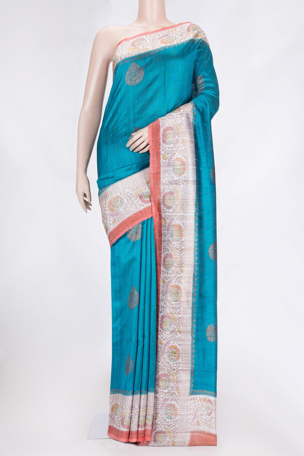 Peacock Blue Dual Tone Tussar Saree with Zari Butta on the body and Zari Border.  displayed on a mannequin
