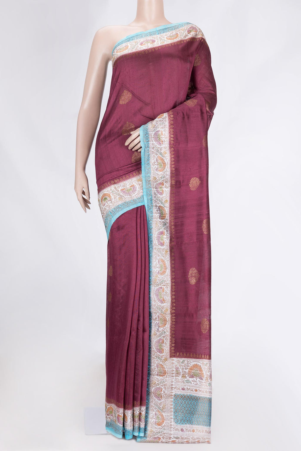 Maroon Dual Tone Tussar Saree with Zari Butta on the body and Zari Border.  displayed on a mannequin